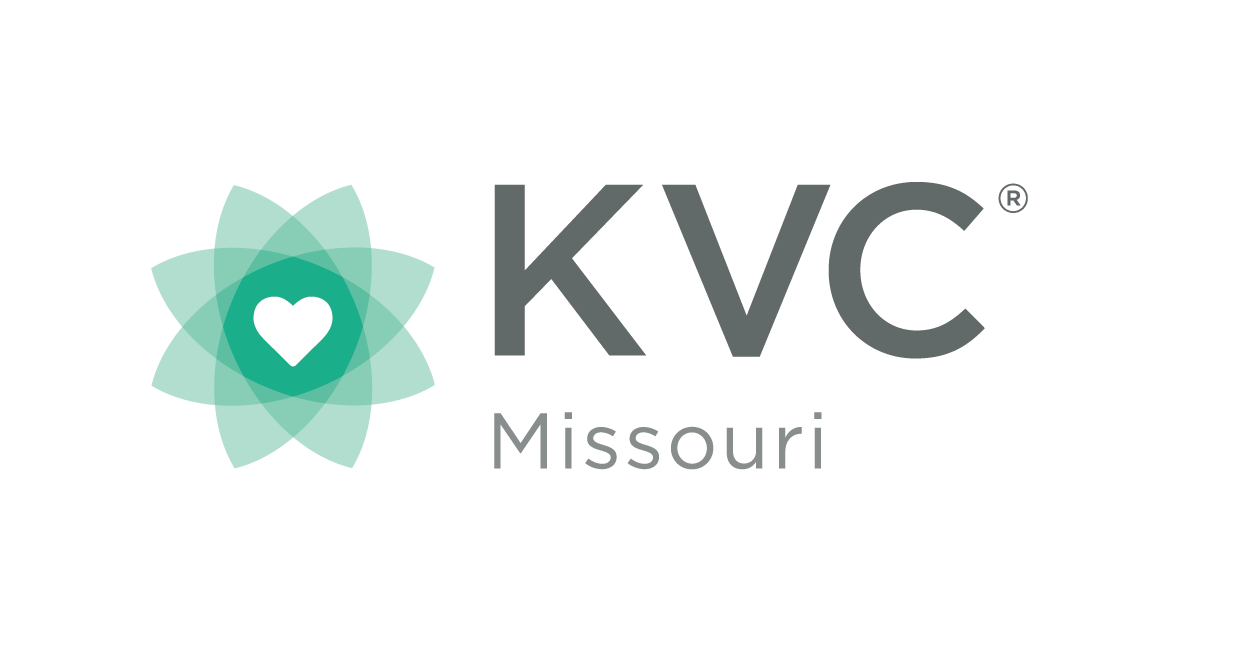KVC Missouri - "KVC" large, bold , and grey font. "Missouri" smaller grey font.